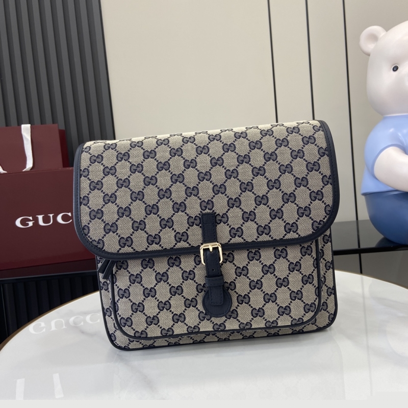 G*u*i clutch bags
